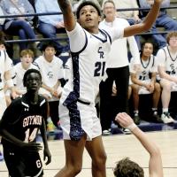 Brendon Evans twists his upper body back toward the goal to shoot the ball