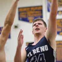 Kolton Hunt shoots a hook shot in the lane