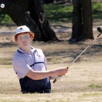 Baylor Pearson blasts out of the sand trap