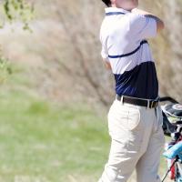 Jackson Albrecht watches his tee shot