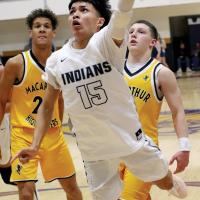 Rossi Harjo shoots in the first half against Lawton MacArthur