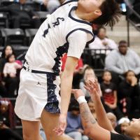 Carter Roman Nose grabs the ball off the rim