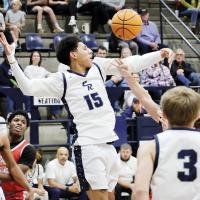 Hezakiya Satepauhoodle swats away a Titans shot