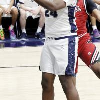 Isaiah Smith battles for a rebound