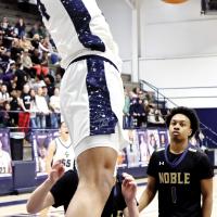 Tre Davis slams down the basket off a specially designed play