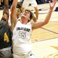 Kolton Hunt battles in the paint for a rebound
