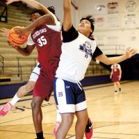 James Reveles misses a rebound attempt