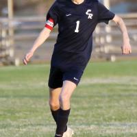 Collin Vickers dribbles up the field