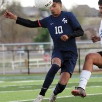 Edgar Garcia redirects the ball with his head