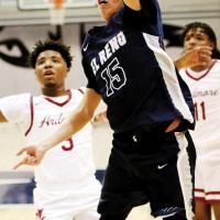 Rossi Harjo shoots a layup