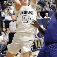 Alex Elizondo jumps past a Mount St. Mary’s defender to shoot a jumper