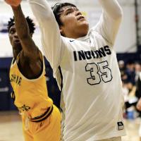 James Reveles shoots a jumper
