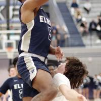 Diante Palmer jumps through a block attempt by a Piedmont player