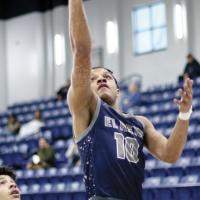 Kaleb Blackwolf shoots a layup