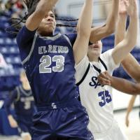 Phoenix Whiteshirt battles for a rebound