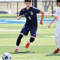 Carlos Garcia chases down a loose ball 