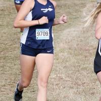 Emmary Elizondo runs down a hill