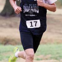 Jeffrey Elizondo peers through the rain and the wind on the second loop of the cross country course