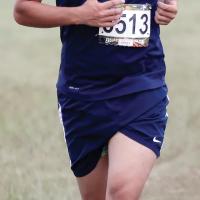 Cobyn Mendez runs in the recent Suburban Conference Championships