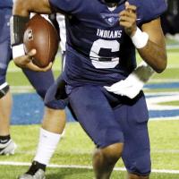Elijah Fisher runs to the outside