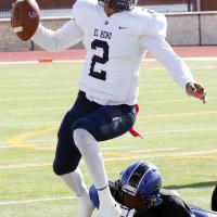 Dorian Plumley hop-steps out of a tackle attempt