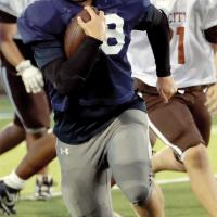 Grant First breaks into open ground during a run against Elk City