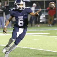 Elijah Fisher pitches off the ball on a sweep play