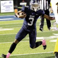 Malachi Nicholson looks for a running lane on a sweep play