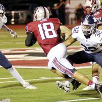 Kamon Avance and William Elledge converge on a Weatherford player 