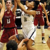EHS girls basketball_Black-Harmon tries to grab rebound