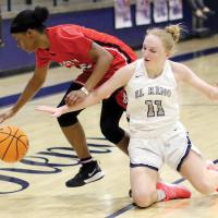 EHS girls basketball_Holsted attempts to slide under player