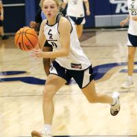 Kenzie Holsted dribbles on a fast break