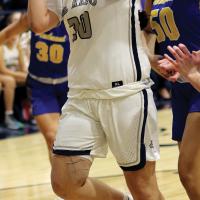 EHS girls basketball_Primeaux puts up shot along baseline