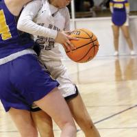 Tetona Blackowl takes a forearm to the face by a Piedmont defender