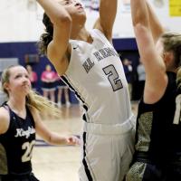 Ashlyn Evans-Thompson shoots a jumper
