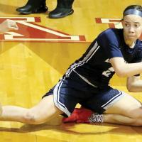 Ashlyn Evans-Thompson comes up with a loose ball after forcing a steal