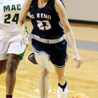 Tetona Blackowl dribbles up the court on a fast-break play