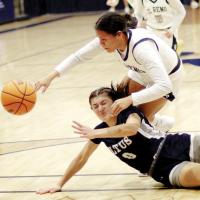 Nazhoni Sleeper is fouled by an Altus player