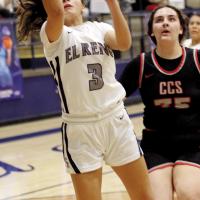 Phallyn Guzman shoots a fastbreak layup
