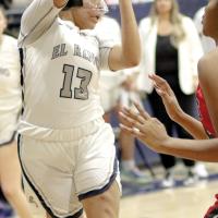 Nazhoni Sleeper jumps into the air to make a pass