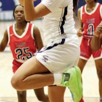 Jaylin Reveles shoots a layup