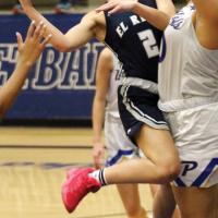 Ashlyn Evans-Thompson draws contact while shooting