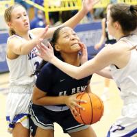 Janae Black-Harmon gets slapped in the chin while setting up for a put-back attempt