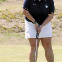 Skylar Ayers watches a putt
