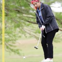 Kallie Maifield pops her ball up in the air