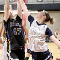 Halli Ferguson battles for a rebound