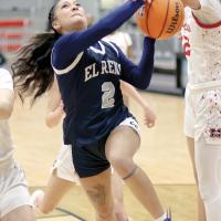Juliana Thomas gets fouled while driving to the basket
