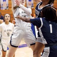 Reagan Bugaj shoots a jumper through a defender’s hand