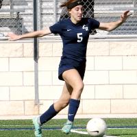 Caroline Huber dribbles the ball