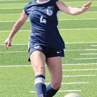 Lily Hayes fires a shot toward the goal